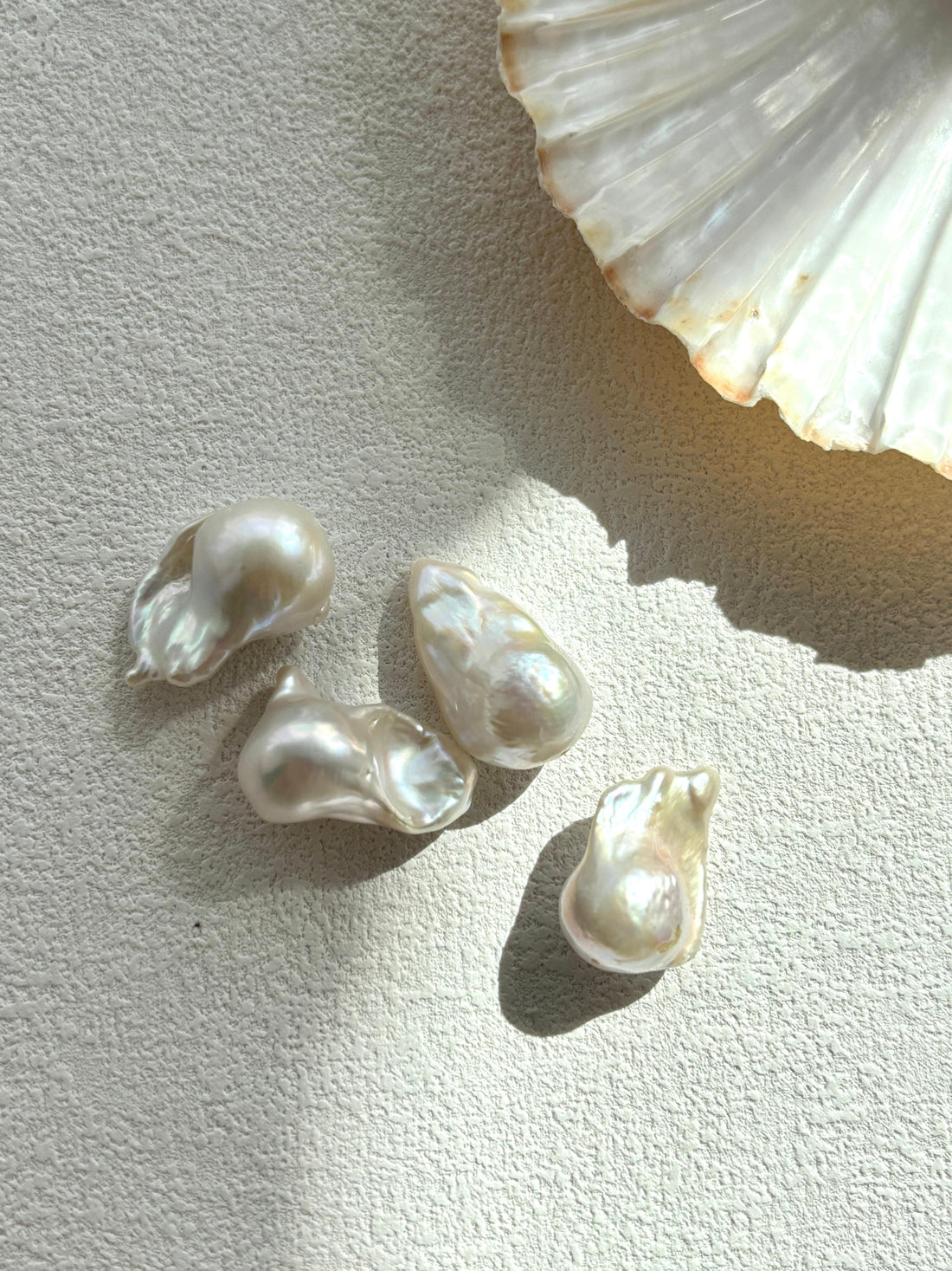 How to Differentiate Real Pearls from Fake Pearls