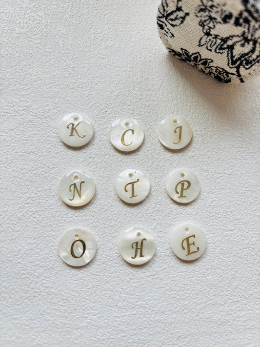 Shell Initial Charm